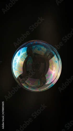 Abstract colorful fluid swirl liquid bokeh background artistic motion blur smooth flowing colors reflection light
