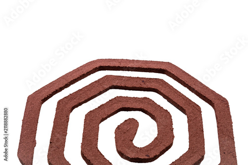 фотографія Reddish-brown mosquito repellent coil, a spiral-shaped insecticide incense mat m