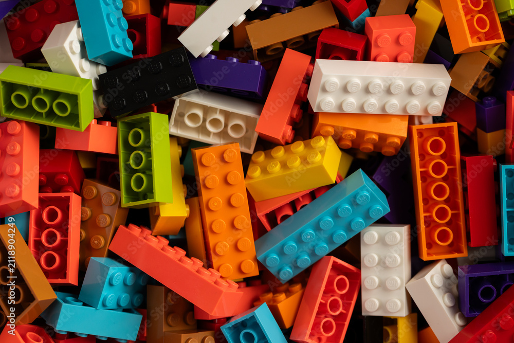 Fototapeta premium Colorful mix of plastic Lego building blocks and bricks background