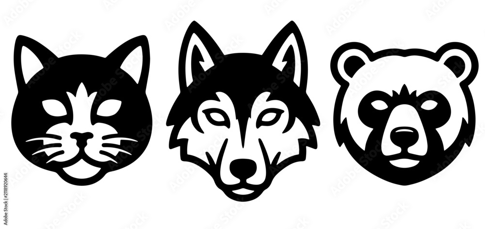 Obraz premium Black animal head silhouettes of a cat wolf and bear vector illustration on white background