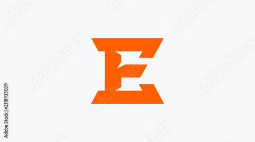Orange slab serif letter E logo icon.