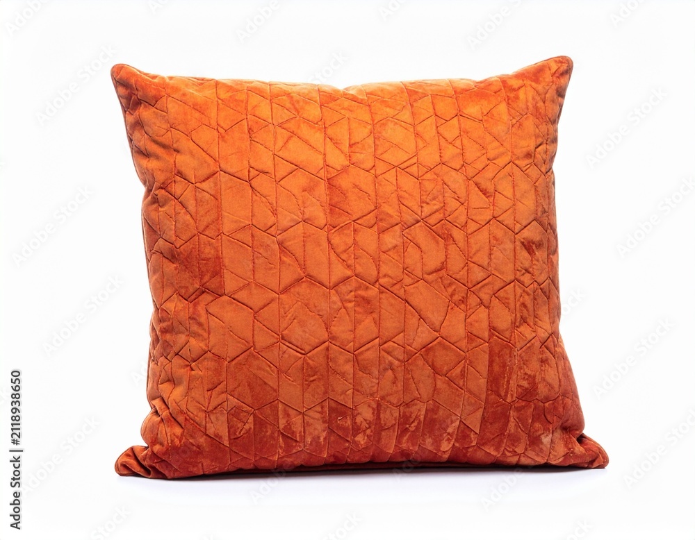 Obraz premium Worn burnt orange throw pillow with faded geometric pattern isolated on white background