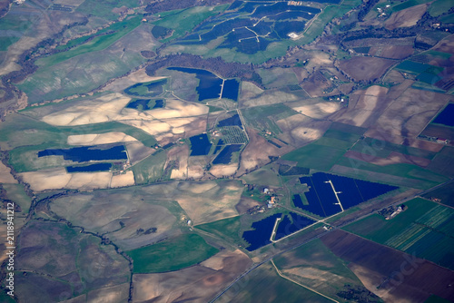 lazio solar panels aerial view from airplane window near bracciano lake italy
