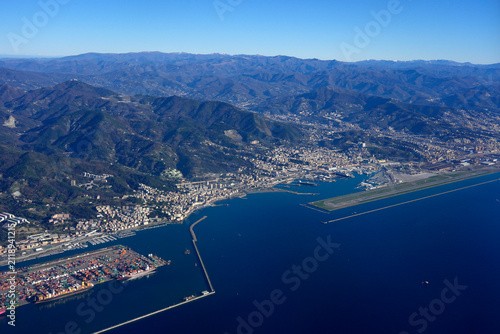 Aerial View of Genoa Coastline With Airport Runway, Port and Mountainous Urban Landscape