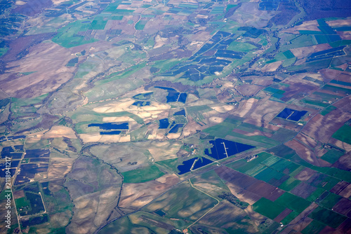 lazio solar panels aerial view from airplane window near bracciano lake italy