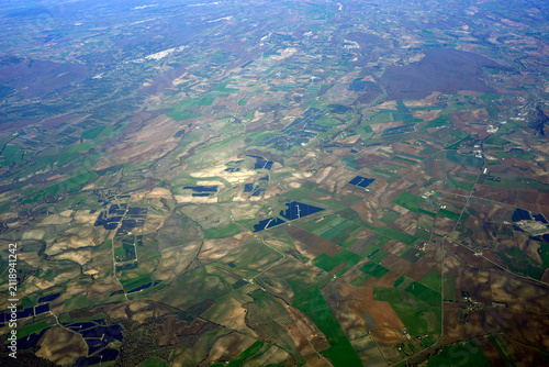 lazio solar panels aerial view from airplane window near bracciano lake italy