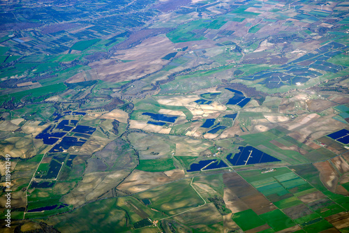 lazio solar panels aerial view from airplane window near bracciano lake italy