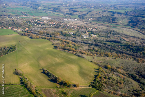 farmed fields near bracciano lake aerial view from airplane window