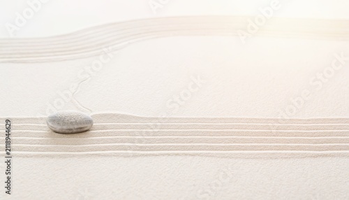 Meditation Sand Pattern Concept. Circular tractor tracks in a snowy field with a single tree in the center.