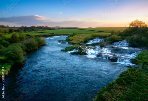 River with cascading waterf...
