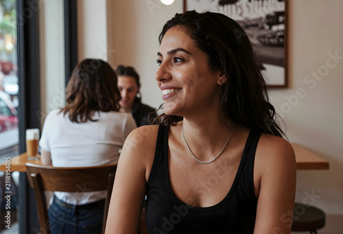 Smiling young woman in a bl...