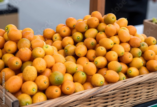 Pile of fresh organic kumqu...