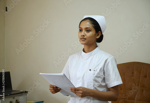 Young female nurse in white...