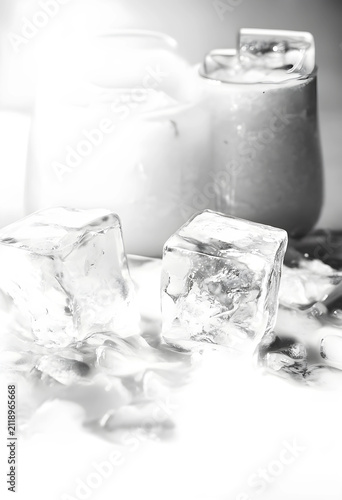 Clear ice cubes melting on ...