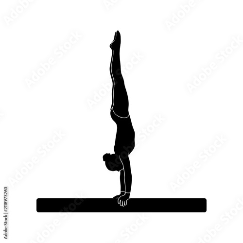 Obraz na plátně Gymnast performs a perfect handstand on a balance beam in this minimalist black silhouette design