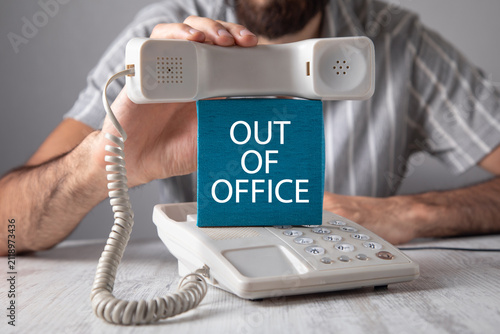 Man showing Out Of Office message.
