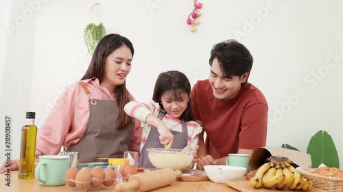 Family Enjoys Baking Together in the Kitchen While Making Cookies
