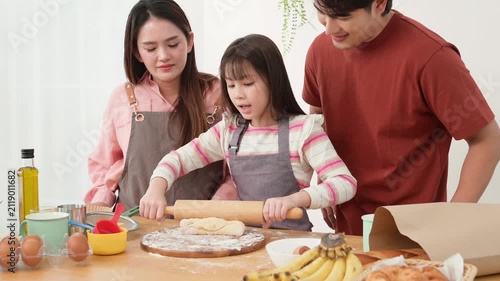 Family Enjoys Baking Together in the Kitchen While Making Cookies