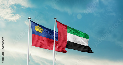 Foto Liechtenstein and UAE friendship flags are waving in the sky