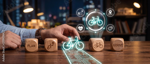 A person interacting with a digital interface representing bicycle trip planning, navigation, and health tracking