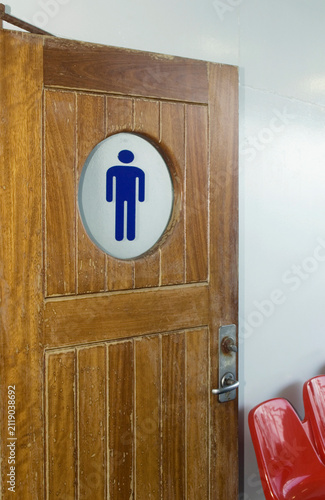 Men restroom doorway onboard a ferryboat