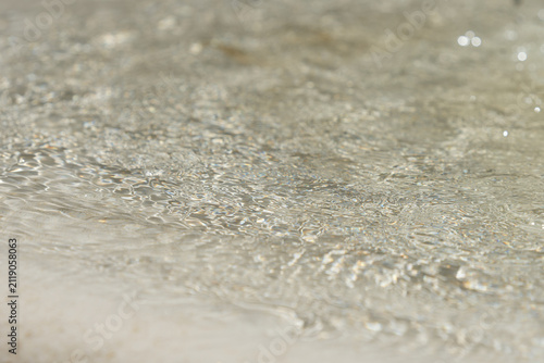 Принти на полотні Clear water surface rippling with light reflections