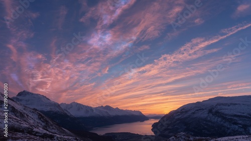Beautiful Golden Sunset Over Snow Covered Mountain Fjord