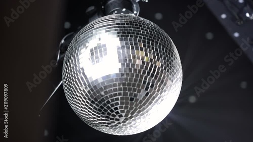 Close-Up Rotating Disco Mirror Ball with Light Reflections