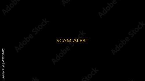 Yellow SCAM ALERT text animation on a black background, creating a warning notification concept for fraud, security risk and online safety.