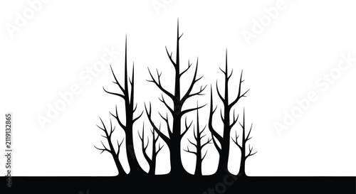 Bare trees silhouette against a white background a minimalist winter scene woodland