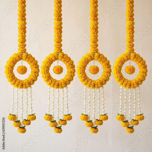 Indian Marigold Floral Hanging Garlands Handcrafted from Fresh Golden Yellow Blooms.
