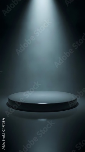 Dark circular podium under a spotlight