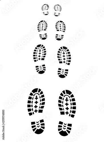 Set of black shoe footprints showing walking steps of different sizes for concepts