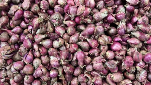 Fresh shallots. Red spice paste, often needed when cooking.