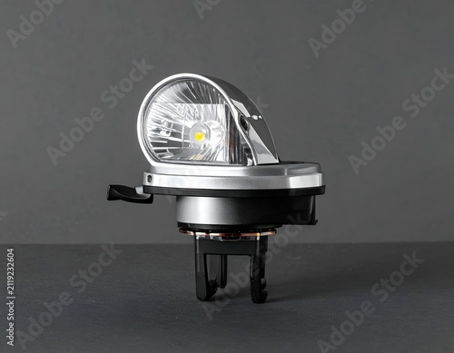 Modern LED Bicycle Headlight with Universal Mounting Bracket Isolated on Gray