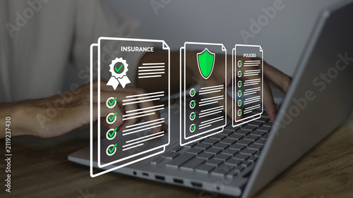 businessman reviewing digital insurance policy documents on laptop with contract ribbon, shield, and policy checklist icons for risk management, compliance, and corporate security