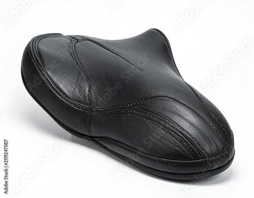 Black leather bicycle seat isolated on a white background studio shot