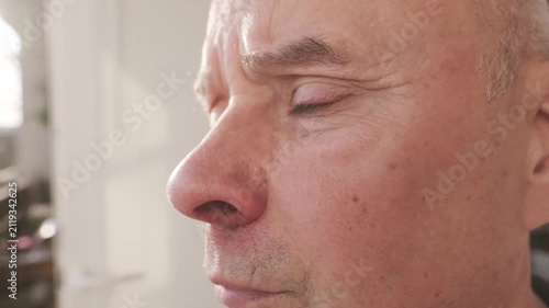 hands examining irritated nose an older patient, closeup facial skin, medical checkup, inflammation, dermatology care, seasonal flu symptoms requiring medical attention and treatment, health assessmen