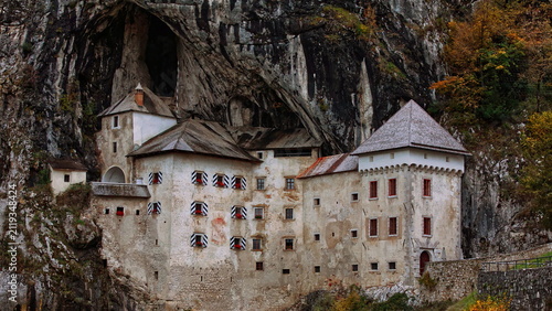 Predjama Castle (Predjamski grad), Renaissance fort built for defense under a natural rock arch high in the mountain stone wall. Postojna-Slovenia-199