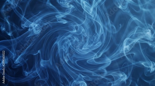 Abstract swirling blue smoke texture background with wispy formations and dramatic lighting for artistic design and atmospheric effects