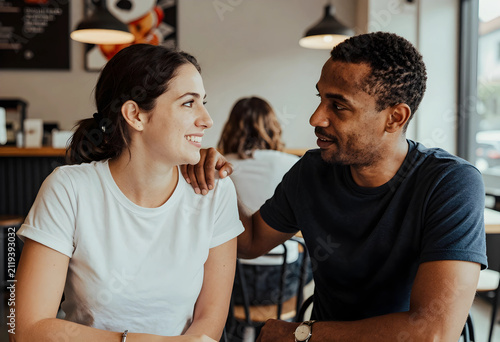 Happy diverse couple smilin...