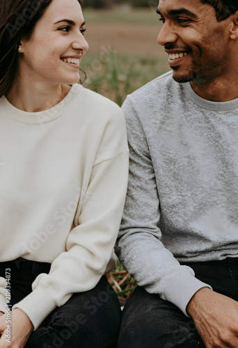 Happy diverse couple smilin...