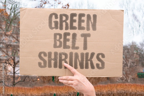 Bild auf Leinwand "Green Belt Shrinks" A vegetated area contracts as aridity expands