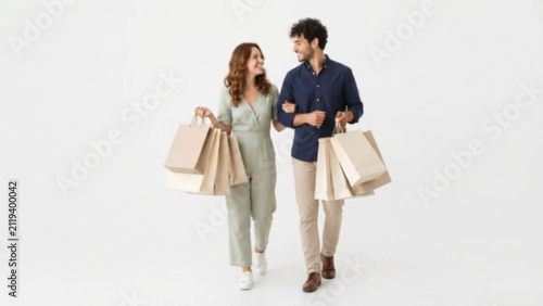 young couple with shopping bags