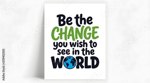 Inspirational quote be the change you wish to see in the world with a small earth globe icon