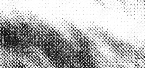 Broad curved printed form fading into fine monochrome halftone grain.