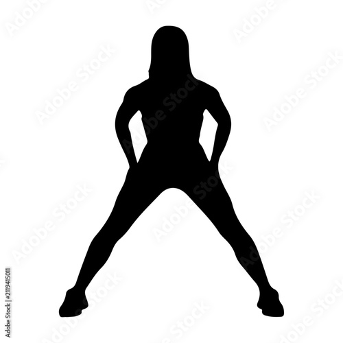 Obraz na płótnie Silhouette of a Woman Standing Confidently with Legs Apart.