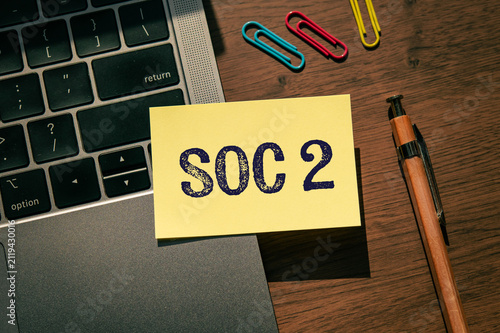 SOC 2 Compliance Standards on Desk with Business Tools — ideal for IT security and governance articles