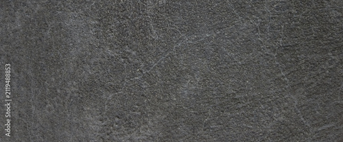 Dark gray slate texture with subtle scratches, charcoal stone background for food photography, natural black rock surface for product backdrop