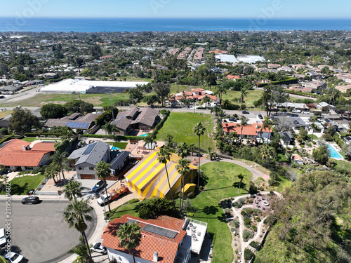 Aerial view of Termite fumigation tent, whole-structure treatment process that involves sealing a building in a tarp, releasing a lethal gas, and aerating the property
